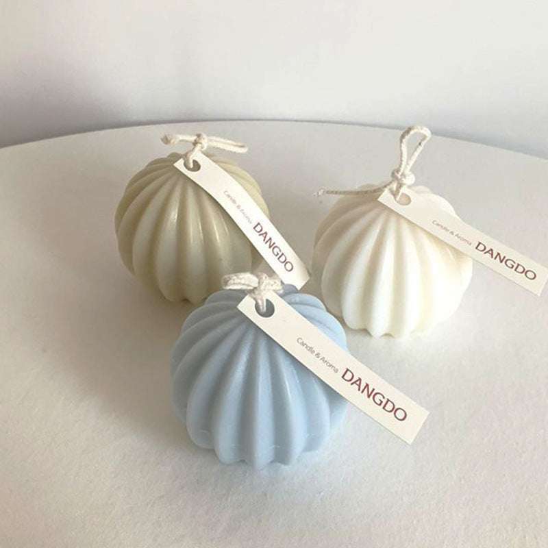 Relaxing prickly pear scented candle on table

