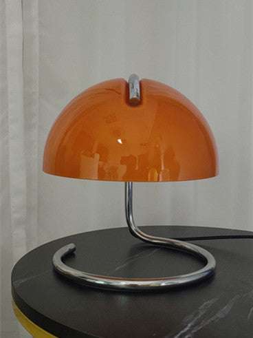 Vintage-style metal table lamp on bedroom


