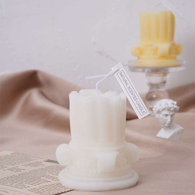 Decorative scented candle on table for cozy interior photos

